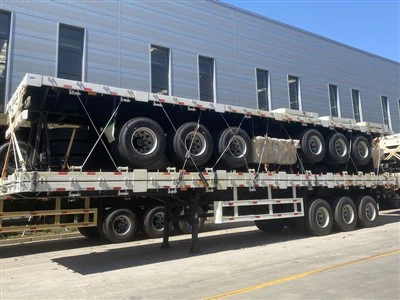 Parduodama 3 ašių plokščiosios priekabos